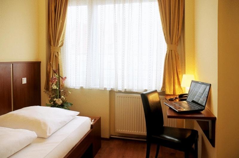 Atlas City Hotel München Szoba fotó